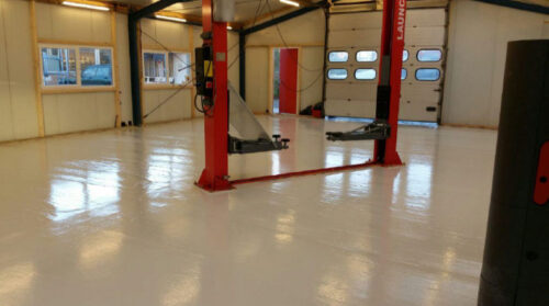 Garagevloer Rotterdam – renovatie betonvloer automobielbedrijf