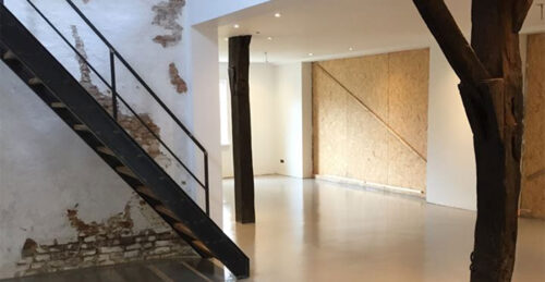 Industriële gietvloer – robuuste winkelvloer met waterdichte afwerking