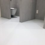 Microcement wanden showroom Amsterdam