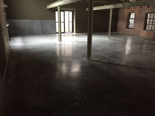 Nat schuren en impregneren betonvloer Zutphen