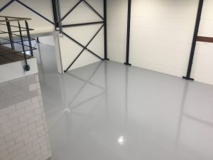 Lees meer over het artikel Sterke industriële coatingvloer bij bouwbedrijf in Arnhem