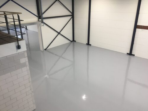 Sterke industriële coatingvloer bij bouwbedrijf in Arnhem